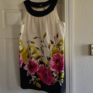 Cute summer dress,  size 14, dress is black, and  white with a floral design.